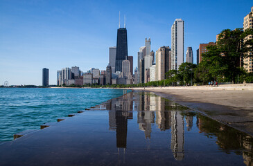Panorama view of Chicago skylines reflection from beach 
