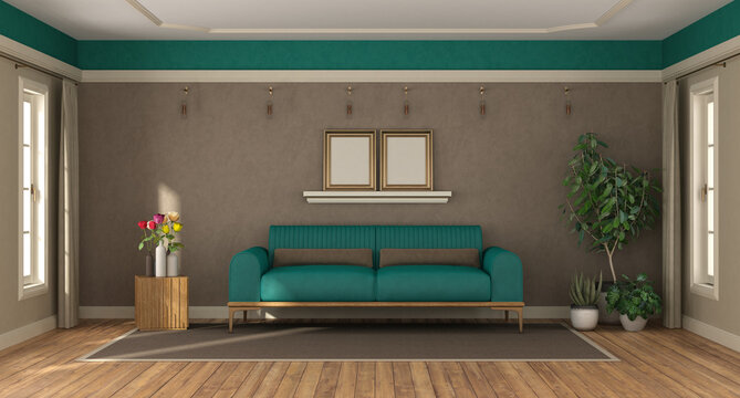 Elegant living area with teal sofa set, stylish greenery, and modern wall decor