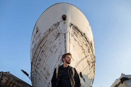 Man at the boat in dry dock