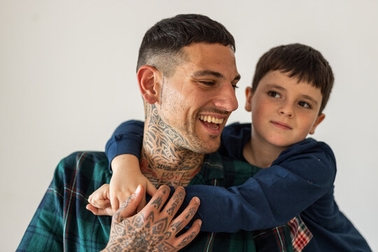 father with his son at home in the morning