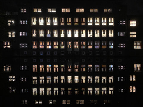 building at night with illuminated windows