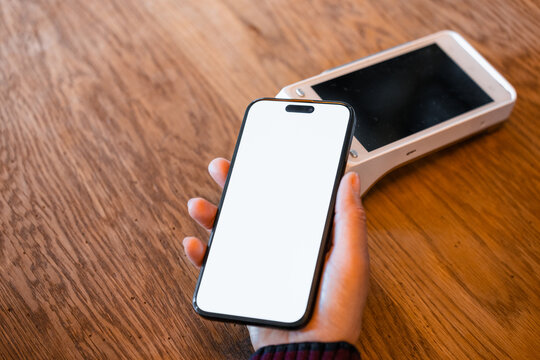 Payment by mobile phone using the terminal