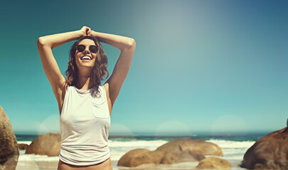 Smile, travel and woman at beach on summer vacation, adventure or holiday with freedom in Mexico....