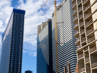 Construction of high-rise buildings in Asia.   Concrete frame without facade.