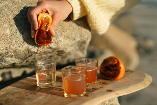 Fruit being held in a woman's hand
