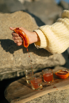 Fruit being held in a woman's hand