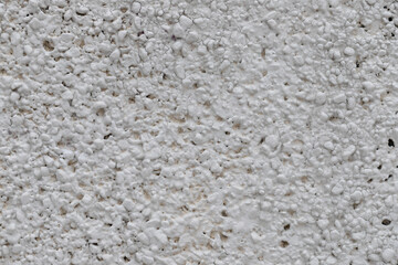 Abstract grey uneven textured wall background, close up