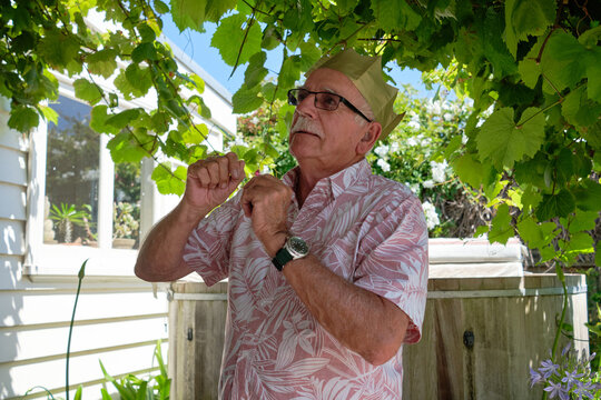 Grandad playing charades on Christmas Day
