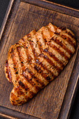 Delicious fresh grilled chicken fillet with spices and herbs