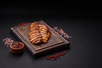Delicious fresh grilled chicken fillet with spices and herbs