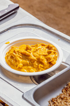 Serving Aji de gallina on a food festival