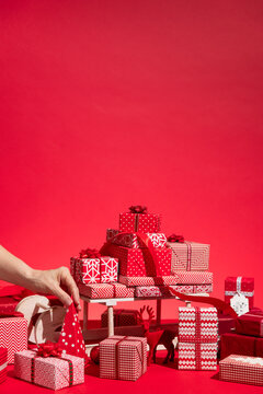 Christmas presents. Red and white themed gift holiday background.
