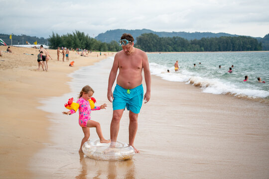 dad and daughter beach lifestyle