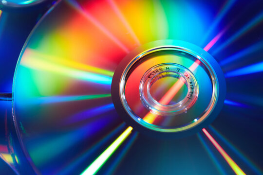 Rainbow light refraction on surface of compact CD disk