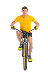 Young man riding modern bicycle on white background