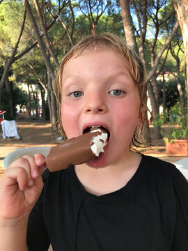 A child eating an ice cream