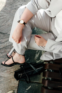 Woman's elegant watch and suit details