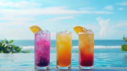 Group of refreshing tropical summer drinks with fruits and ice on tabletop on blurred ocean background - obrazy, fototapety, plakaty
