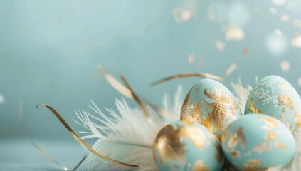 Obraz na płótnie Canvas Easter Eggs with Gold Leaf on Pastel Blue Feathers, Copy Space