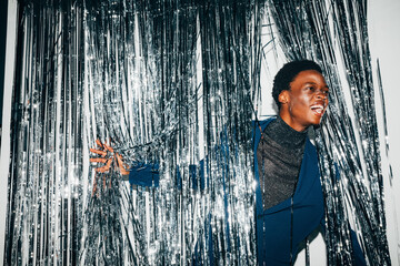 Man and string curtain