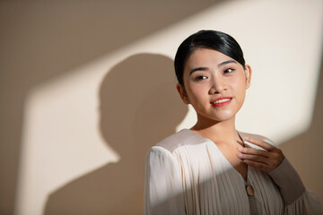 Business photo portrait of a young woman in a business suit