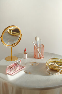 cosmetics and a mirror on the dressing table
