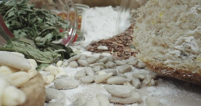 Macro scene of healthy cereals and flour in a paper bag, probe lens dolly cinematic shot