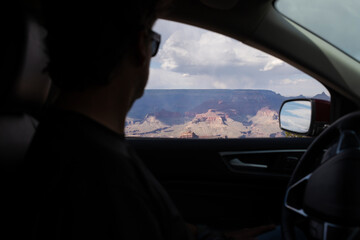 Man driving in Grand Canyon