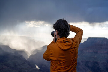 A Man photographing The Grand Canyon