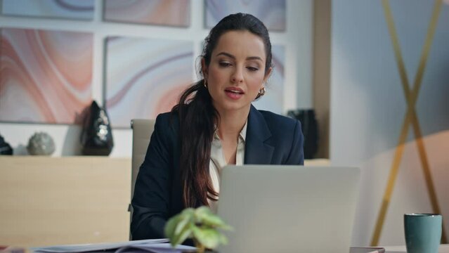 Smiling accountant looking papers workspace closeup. Excited employee rejoicing