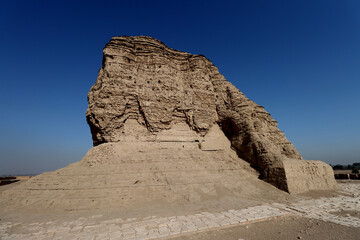 ziggurat of akarkuf and big rock with blue sky in Baghdad