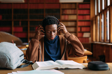 Student reading in library