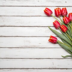 Red tulip flower on white wooden table background. Mothers Day.