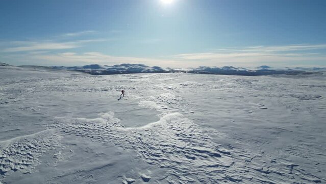 Backcountry skiing on Saukampen in Gudbrandsdalen in Norway, with view of Rondane in the background
