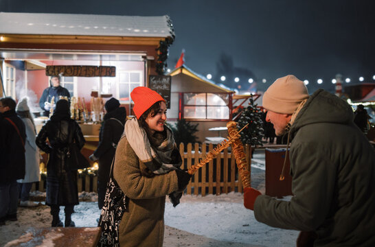 Couple's Potato Sword Fight at Christmas Market