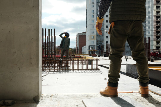 Two Builders On Sunny Day