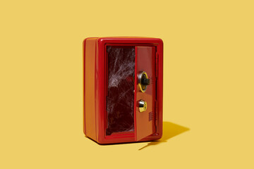 spiderwebs in a red safe