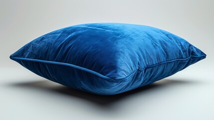 Vivid blue pillow depicted in isolation against a white background.
