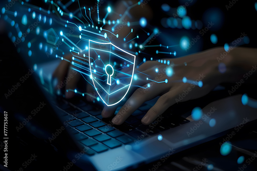 Poster a person's hands are typing on their laptop with an abstract digital shield and keyhole icon hoverin