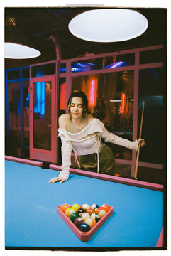 woman playing pool table snooker game