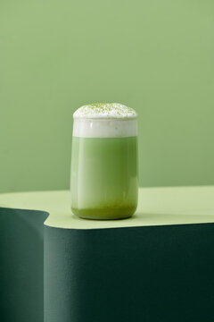 a Glass of Ice matcha latte on the table