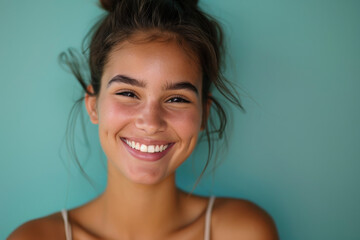 portrait of a young girl smiling looking at front