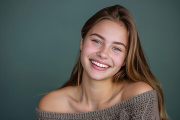 portrait of a young girl smiling looking at front