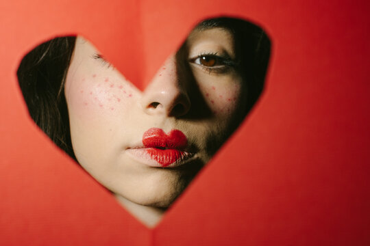 Valentine's Day Portrait Of Woman with Heart-Shaped Lips