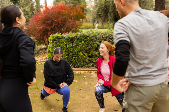 GROUP OF FRIENDS DOING SPORTS
