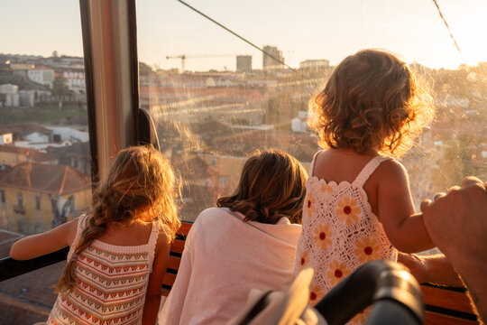 Three kids in porto funicular 
