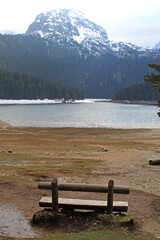 Empty Bench at Crno Lake and Durmitor Mountain in Montenegro Spring