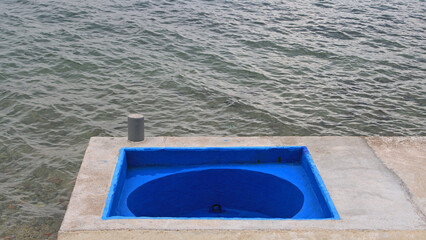 Small Blue Oval Bathtub at Adriatic Sea Coast