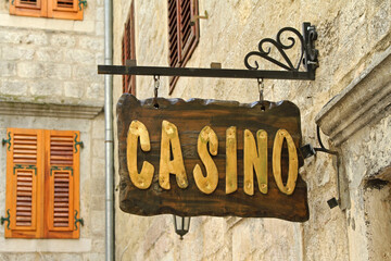 Rustic Wooden Letters Sign Board Casino at Old Building