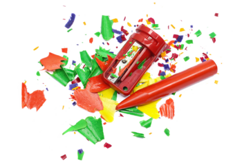 Wax pastel, colorful crayons and spiral shavings from sharpener isolated on white, top view